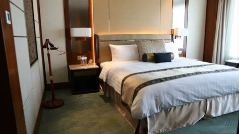 Large Bed with Pillows in the Hotel or at Home Stock Footage 126892390