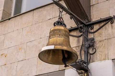 Large bell on the wall close-up Stock Photos
