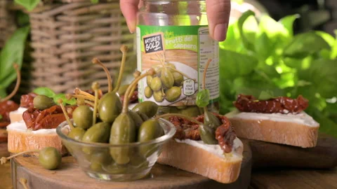 Large berry capers. Capar, capari. From Italy, France or Africa. For appetizers Stock Footage 234133715