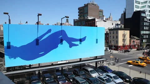 Large Billboard Displaying Artwork in New York City Stock Video Stock Footage 22953033
