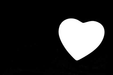 A large black and white image. Light shape. Heart shaped images. Series of p Stock Photos