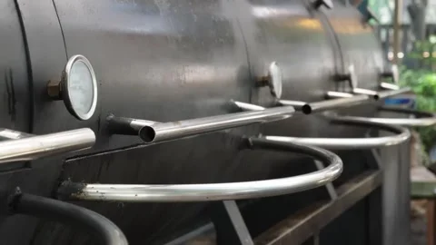 Large black commercial barbecue offset smoker with external thermometers and ste Stock Footage 338212380