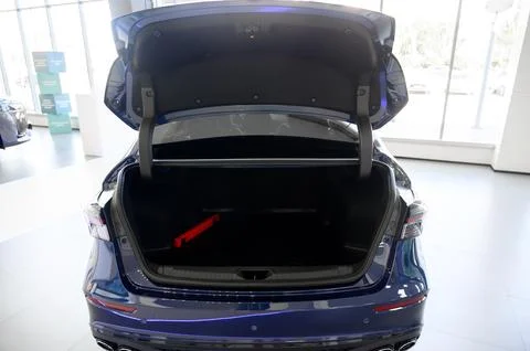 Large black empty car trunk. Open car trunk close up Stock Photos