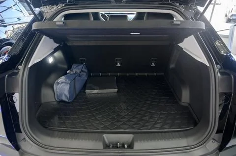 Large black empty car trunk. Open car trunk close up Stock Photos