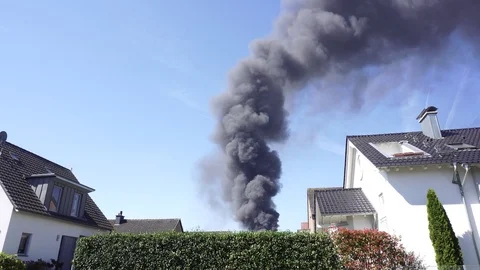 Large Black Smoke Clouds, Fire in Town Stock Footage 98350953
