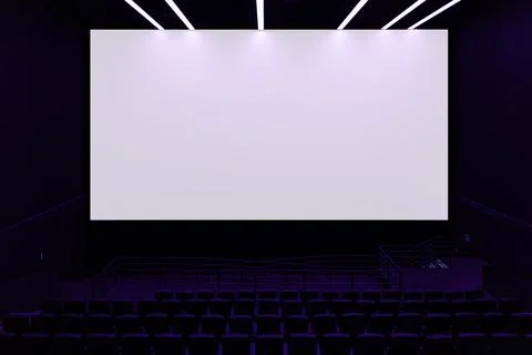 Large blank white cinema screen in dark modern movie theater Stock Photos