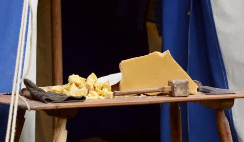 Large block of beeswax broken into chunks Stock Photos