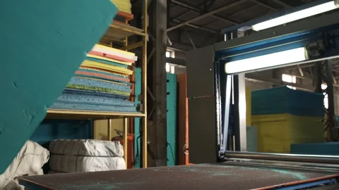 Large block of paralon, raw material, production of mattresses, machine with saw Stock Footage 119197959