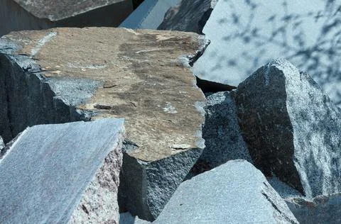 Large blocks of granite rocks piled in a heap Stock Photos