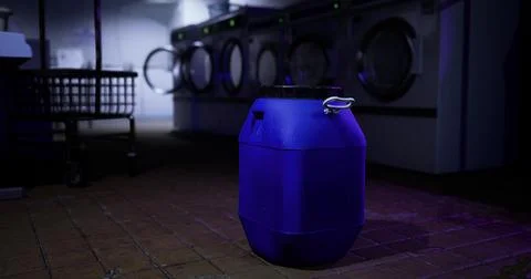 Large blue container placed in a dimly lit laundromat during nighttime Stock Illustration