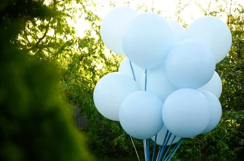 Large blue inflatable balloons with weights Stock Photos