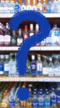 Large blue question mark on abstract blur image of supermarket background. Foto stock