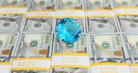 Large blue transparent stack of diamonds made from hundred dollar bills Stock Footage 285585760