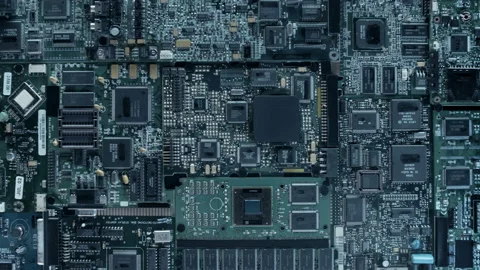 A large board with many microchips, a large processor in the middle Stock Footage 130081195