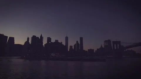 Large boat passing under the Brooklyn Bridge at early morning Video stock 62782300