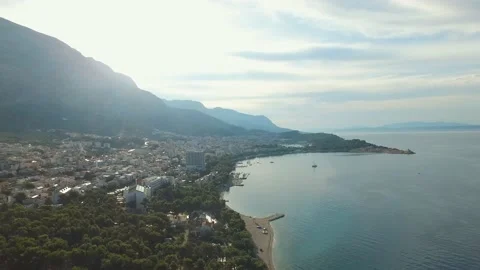 A large body of water with a mountain in the background Stock Footage 131961053