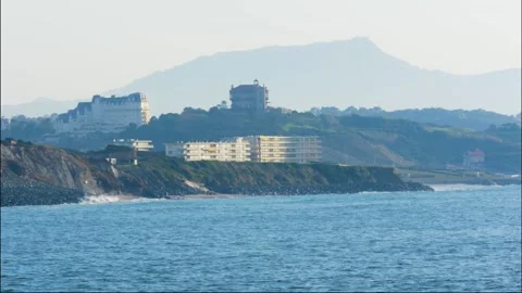 A large body of water with a mountain in the background Stock Footage 156022251