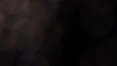 Large bokeh lights overlapping in the dark Video stock 318664136