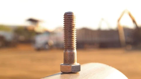 LArge bolt on factory background Stock Footage 119487631