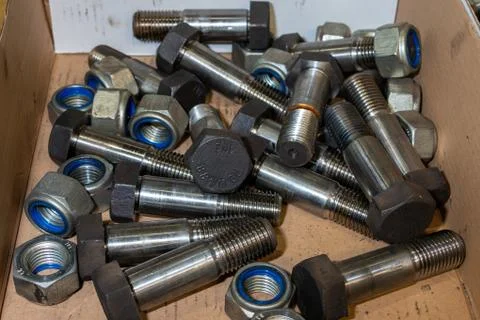 Large bolts and self-locking nuts Stock Photos