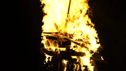 A large bonfire burns in the night Stock Footage 93501816