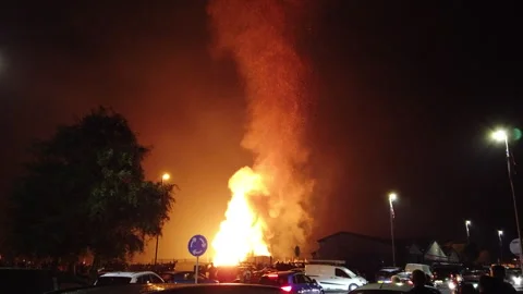 Large Bonfire Collapsing in Flames During the Eleventh Night, Northern Ireland Stock Footage 307236683