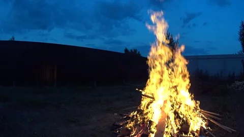 Large bonfire on dark background, low angle shot Video stock 74852440