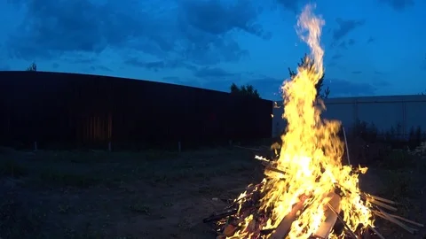 Large bonfire on dark background, low angle shot Stock Footage 74852711