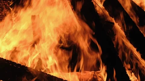 Large bonfire, timber crib, tipi fire, hot fire. Red hot coals Stock Footage 158068400
