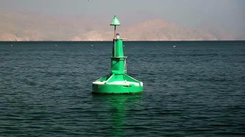 A large border buoy in the middle of the open ocean Stock Footage 236069837