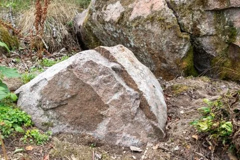 Large boulder with a crack Stock Photos