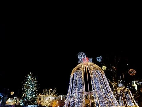 Large bow made of decorative lights. Christmas decorations in Baia Mare cit.. Stock Photos