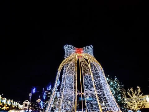 Large bow made of decorative lights. Christmas decorations in Baia Mare cit.. Stock Photos