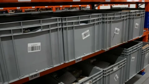 Large boxes for storing items in production Stock Footage 161778326