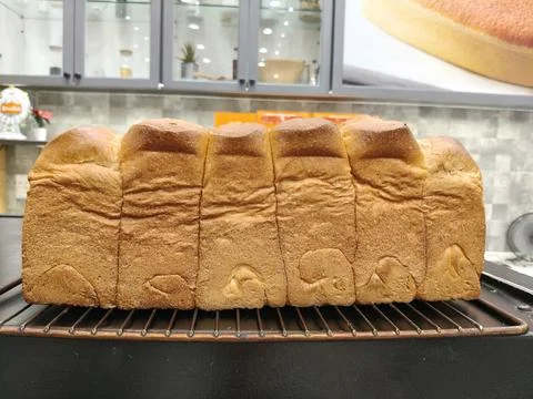 Large Bread loaf. Crispy Baked golden color Stock Photos