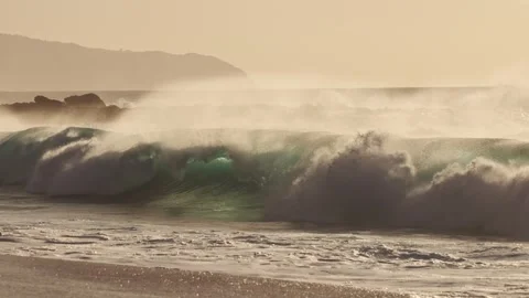 A large breaking wave at Ke Iki beach on the North Shore, Oahu, Hawaii. Stock Footage 270020083