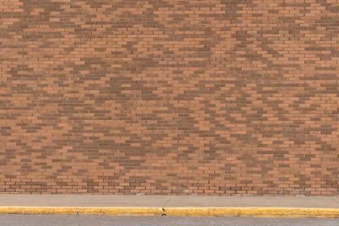 Large Brick Wall with Sidewalk Photos