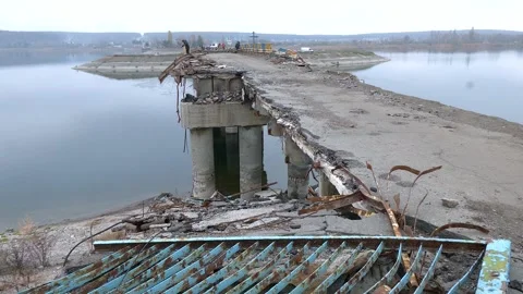 A large bridge destroyed due to hostilities over the reservoir. Russian Stock Footage 224355456