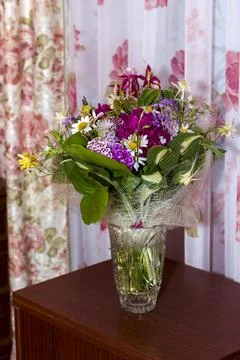 Large bright multi-colored bouquet of wildflowers with peonies and aquilegia Stock Photos