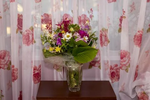 Large bright multi-colored bouquet of wildflowers with peonies and aquilegia Stock Photos