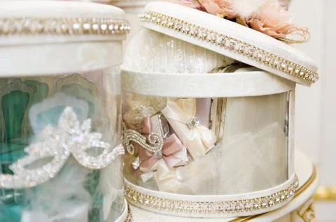 Large bright round gift boxes with transparent walls with slightly open lids 库存照片