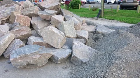 Large broken rocks , stones from excavation. Camera walk Stock Footage 84258053