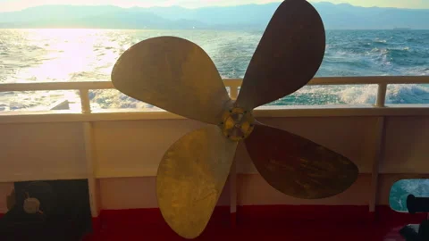 Large Bronze Ship Propeller on Deck Over the Sea Stock Footage 332182118