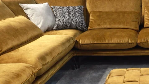 Large brown corner sofa with pillows Video stock 132158826