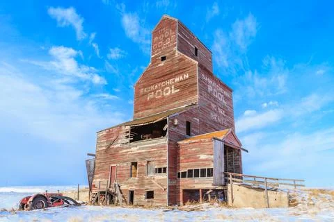 A large brown grain elevator in winter Stock Photos