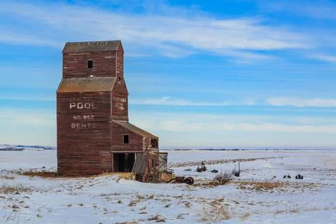 A large brown grain elevator in winter Stock Photos