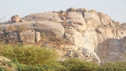 Large brown rocks on the top of mountain, Rocks at the top of hill Stock Footage 151937938