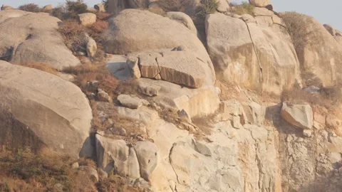 Large brown rocks on the top of mountain, Rocks at the top of hill 動画素材 151938039