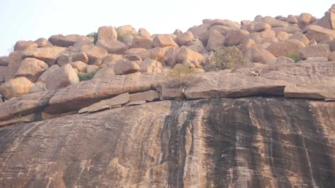Large brown rocks on the top of mountain, Rocks at the top of hill Stock-Footage 151940944