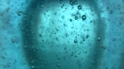 Large bubbles in blue liquid texture Stock Footage 23843414